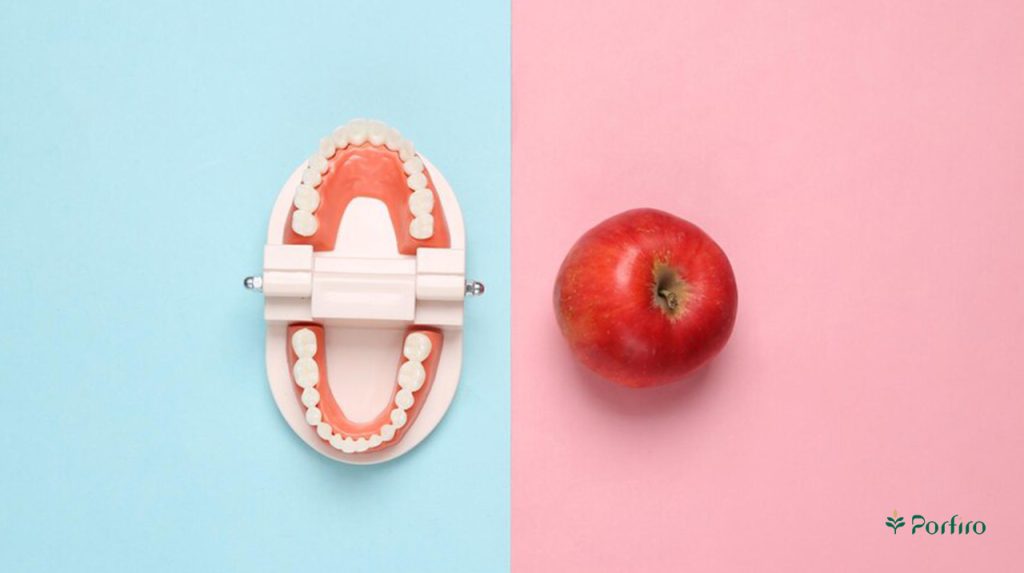 Red apple and healthy teeth
