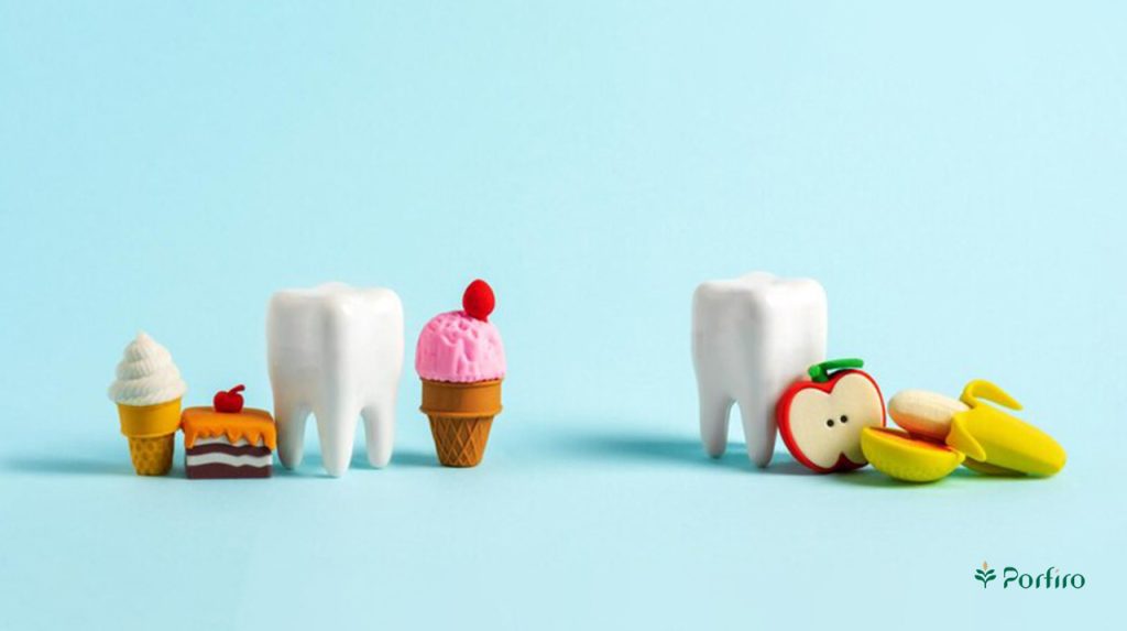 Two healthy teeth and two types of healthy and unhealthy snacks