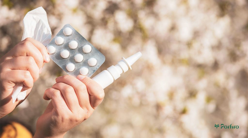 Some allergy treatments, such as pills, sprays, and a tissue in one's hand