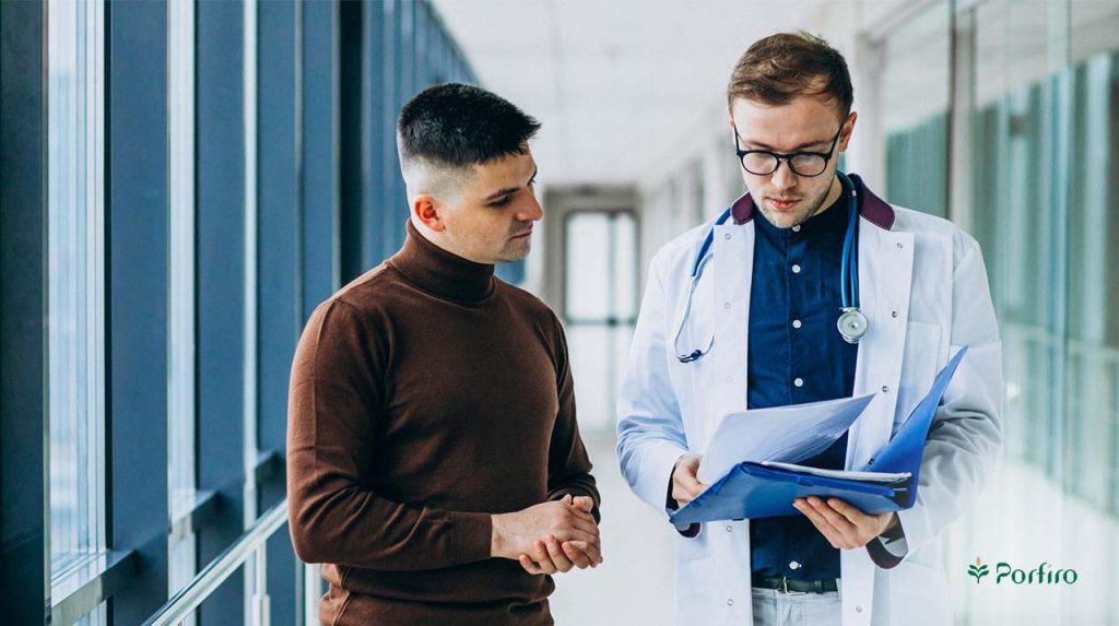 Doctor checking young man's health tests in the article All about men's health