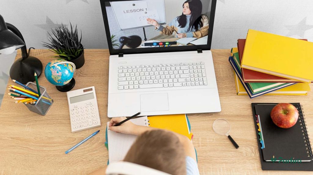 A child is sitting at a study table in front of a laptop, learning a lesson; in order to explain the benefits of social media